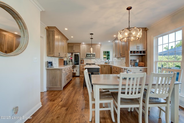 dining area featuring recessed lighting, dark wood-style floors, baseboards, and ornamental molding