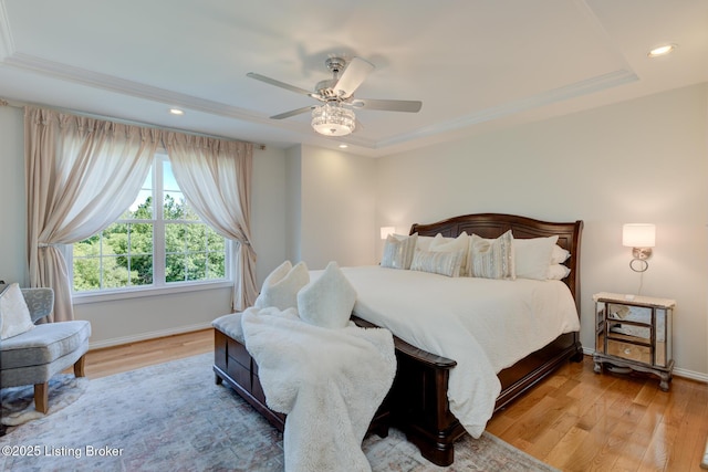 bedroom featuring recessed lighting, baseboards, and wood finished floors