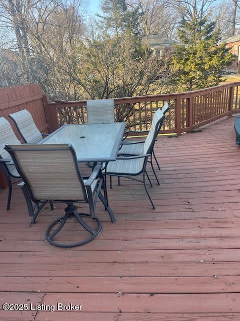 wooden deck with outdoor dining space