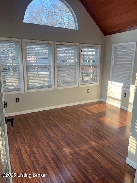 interior space featuring vaulted ceiling and wooden ceiling