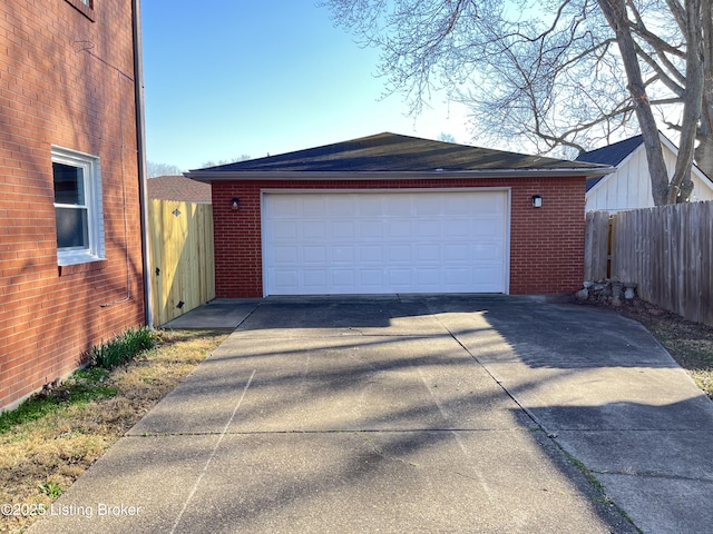 garage featuring fence