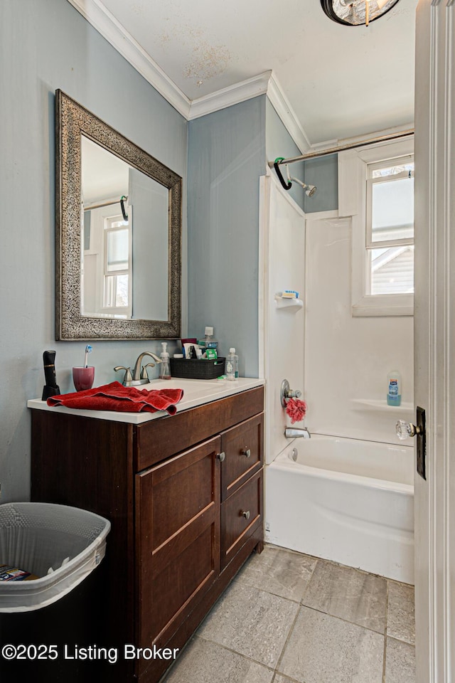 bathroom featuring shower / bath combination, vanity, and crown molding