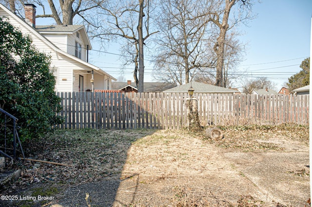 view of yard with fence