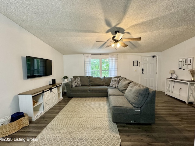 living room featuring lofted ceiling, a ceiling fan, and dark wood-style flooring