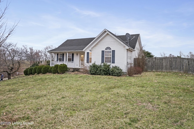 single story home featuring covered porch, a front yard, and fence