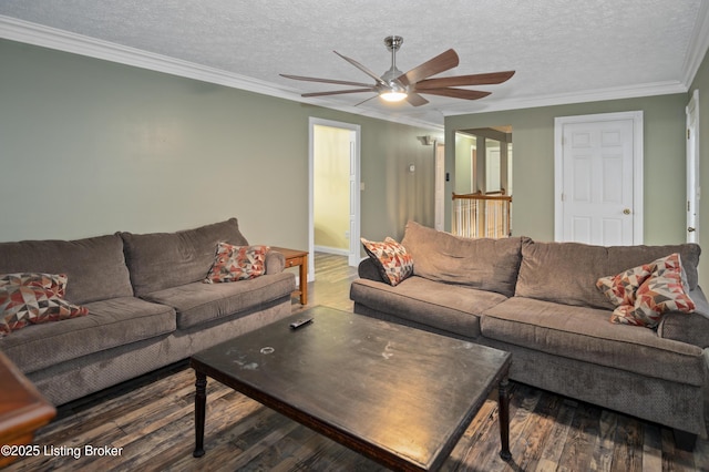 living area featuring ornamental molding, a textured ceiling, a ceiling fan, and wood finished floors