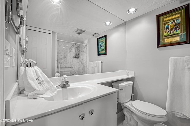 bathroom with a marble finish shower, visible vents, toilet, recessed lighting, and vanity