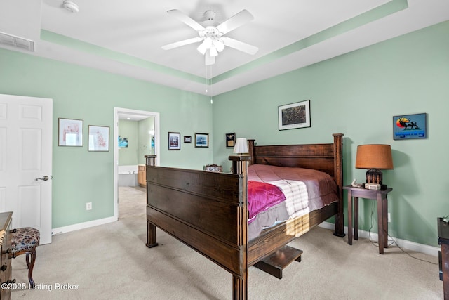 bedroom featuring light carpet, visible vents, and baseboards