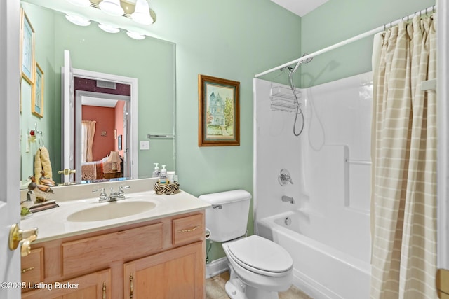 full bath featuring toilet, vanity, and shower / bath combo with shower curtain