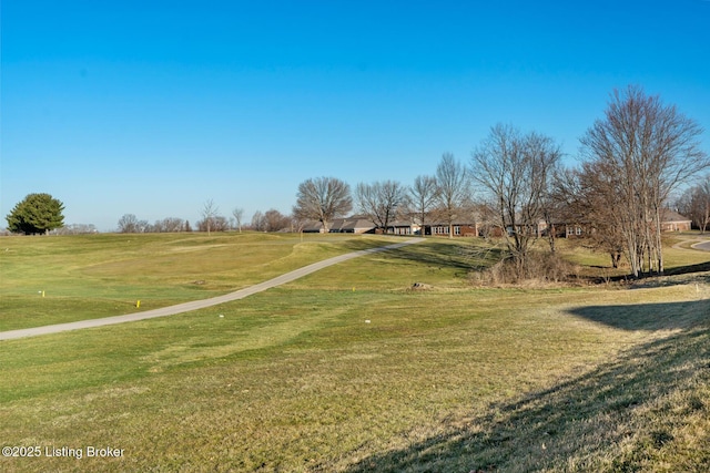 surrounding community featuring a lawn