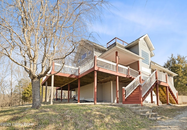 exterior space featuring stairway and a deck