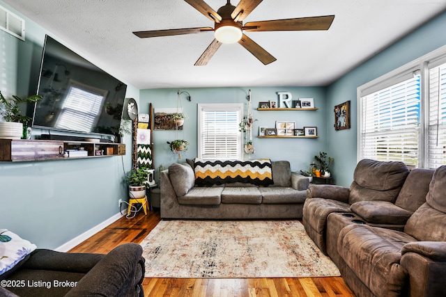 221 Forrest Dr, Lawrenceburg, KY 40342 - living room featuring a ceiling fan, healthy amount of natural light, wood finished floors, and baseboards