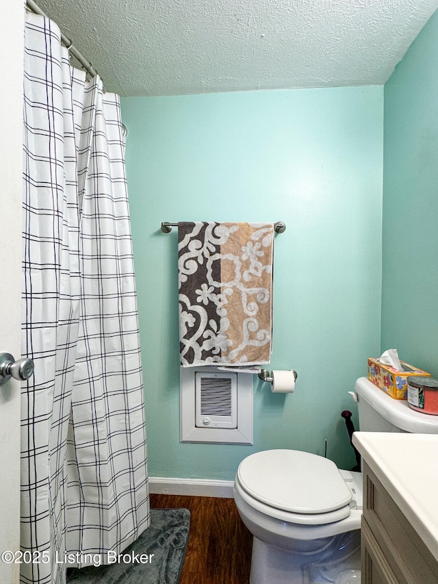 221 Forrest Dr, Lawrenceburg, KY 40342 - full bathroom with toilet, wood finished floors, a textured ceiling, vanity, and curtained shower