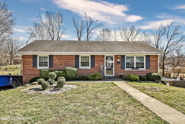 221 Forrest Dr, Lawrenceburg, KY 40342 - view of front of property with a front yard and brick siding