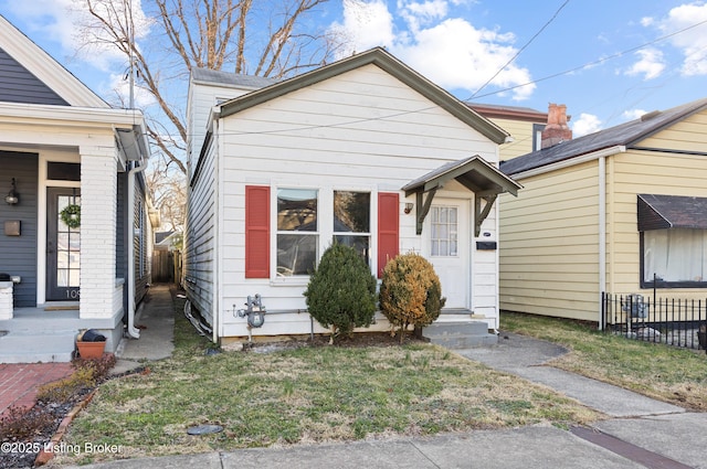 view of front of home with fence and entry steps