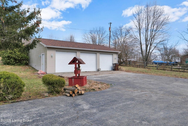 detached garage with fence