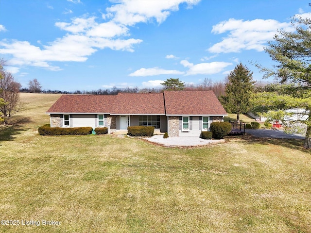 view of front of home with a front yard