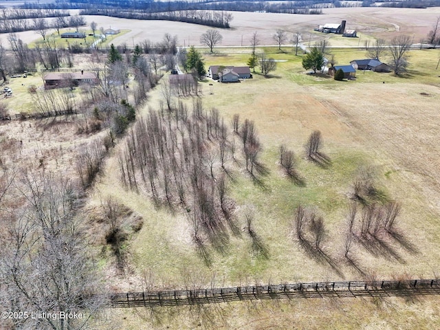 birds eye view of property featuring a rural view