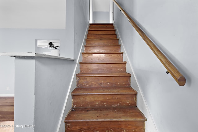 staircase with ceiling fan