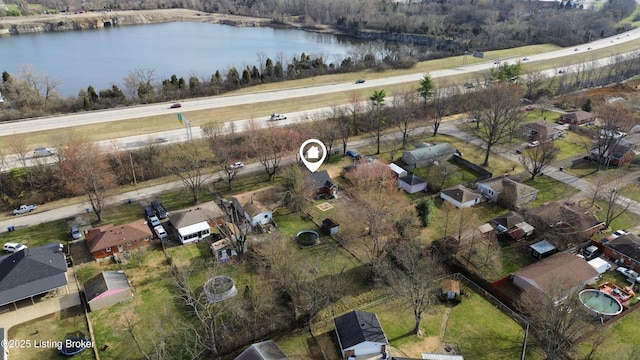 bird's eye view with a residential view and a water view