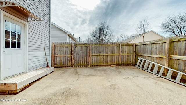 view of patio / terrace featuring fence