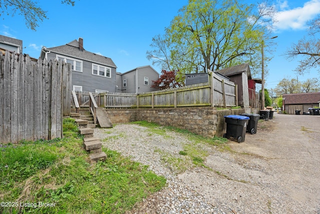 view of yard with fence