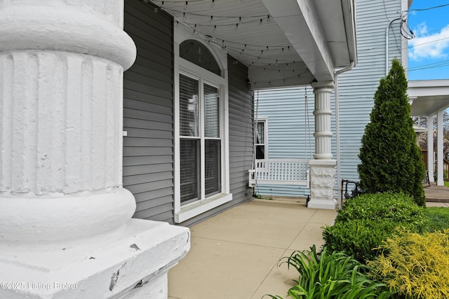 view of patio featuring a porch