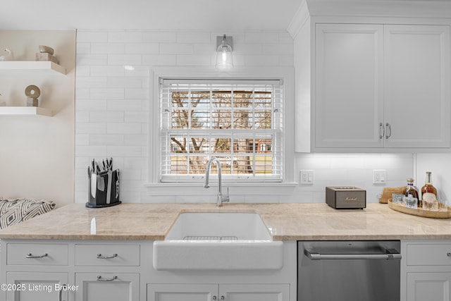 kitchen featuring a sink, open shelves, dishwasher, and white cabinets