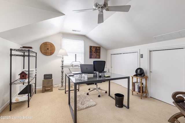 carpeted office featuring vaulted ceiling, a ceiling fan, visible vents, and baseboards