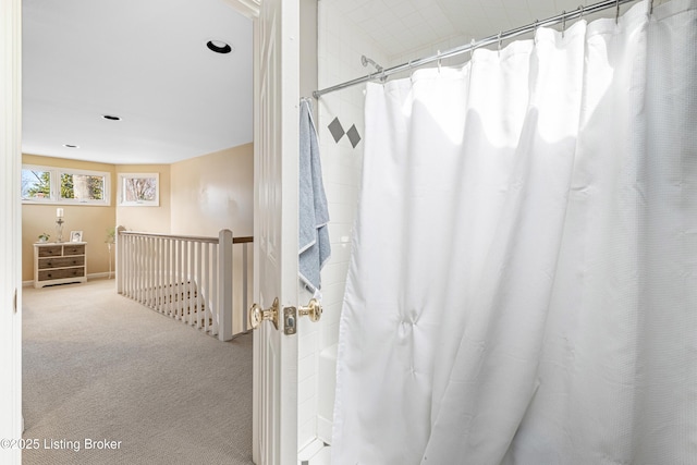 bathroom with a shower with shower curtain