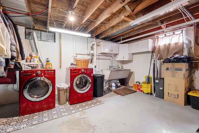 unfinished below grade area with independent washer and dryer and a sink