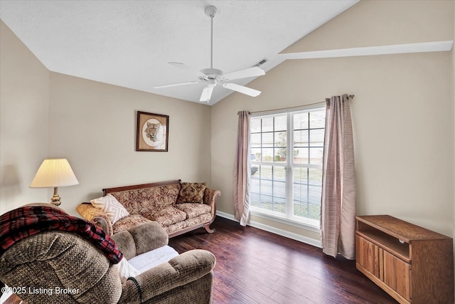 living area with baseboards, visible vents, dark wood finished floors, lofted ceiling, and ceiling fan