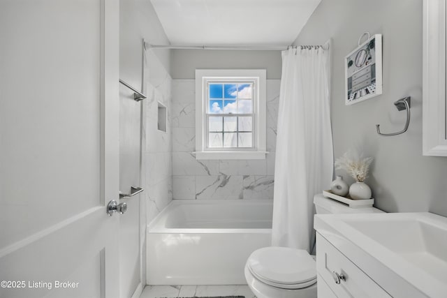 full bath with shower / bath combo with shower curtain, toilet, marble finish floor, and vanity