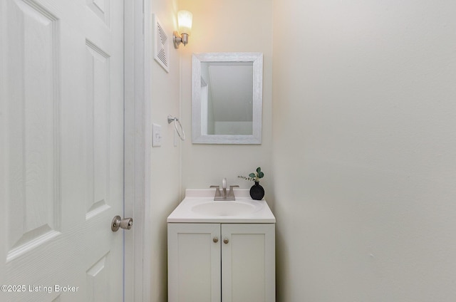 bathroom with visible vents and vanity