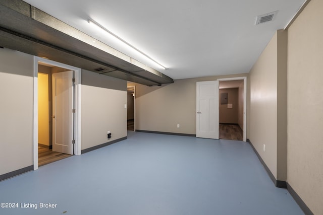 finished basement featuring baseboards and visible vents