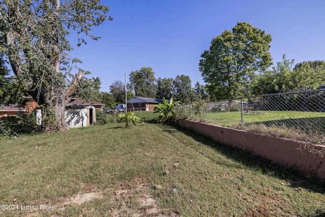 view of yard featuring fence