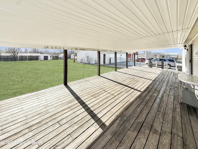 450 Stanley Allen Dr, Vine Grove, KY 40175 - wooden terrace featuring a storage unit and a lawn