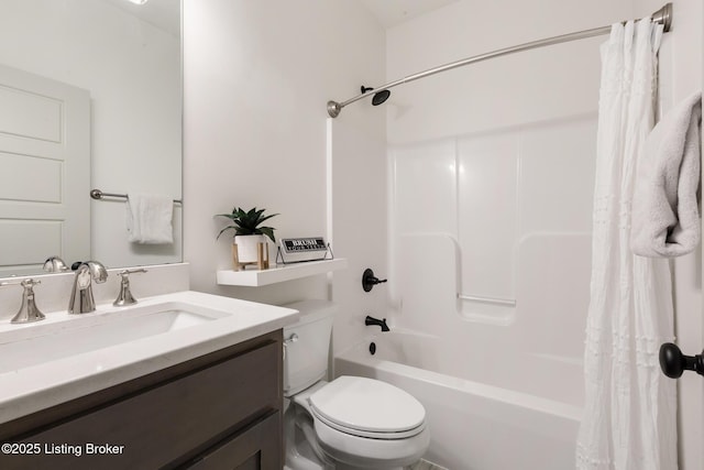 full bathroom featuring toilet, shower / bath combo, and vanity