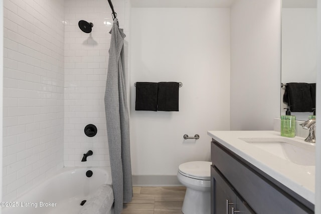 full bathroom featuring baseboards, toilet, vanity, and shower / bath combination with curtain