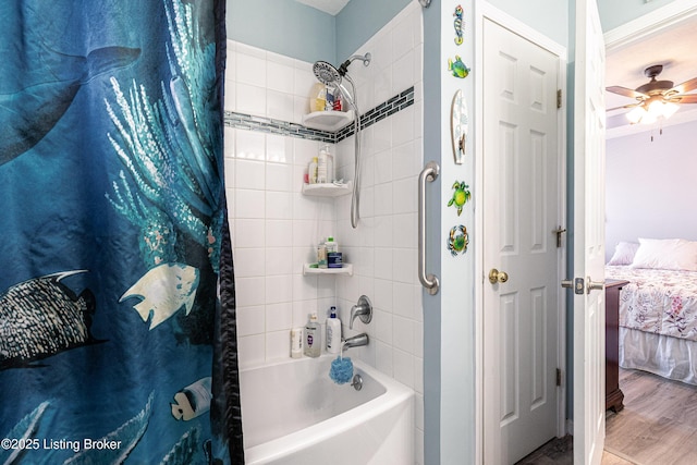 ensuite bathroom with ceiling fan, shower / bath combo with shower curtain, wood finished floors, and ensuite bathroom