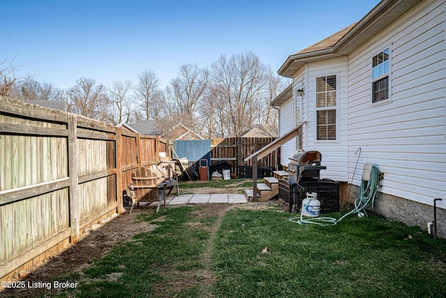 view of yard featuring a fenced backyard