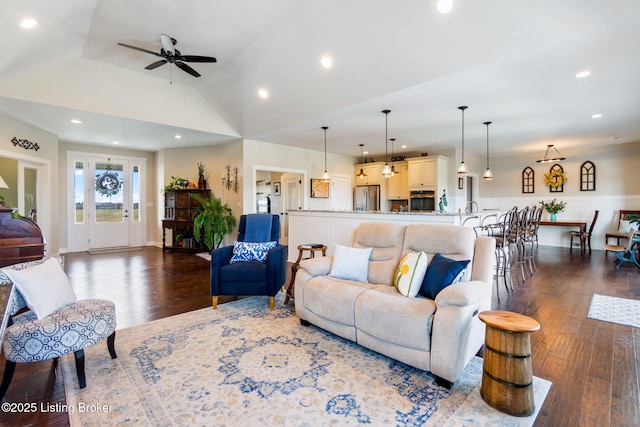 living area with recessed lighting, lofted ceiling, dark wood-style floors, and ceiling fan