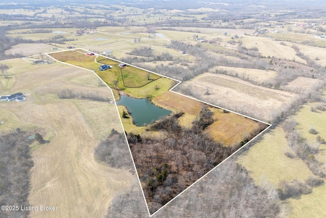 birds eye view of property featuring a rural view and a water view