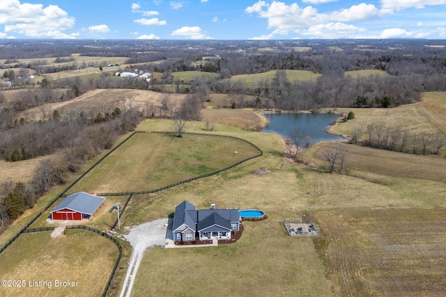 aerial view featuring a rural view and a water view