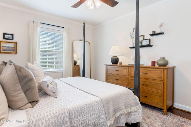 bedroom with a ceiling fan, light wood-style floors, baseboards, and ornamental molding