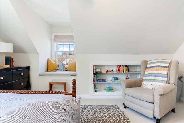 carpeted bedroom featuring lofted ceiling