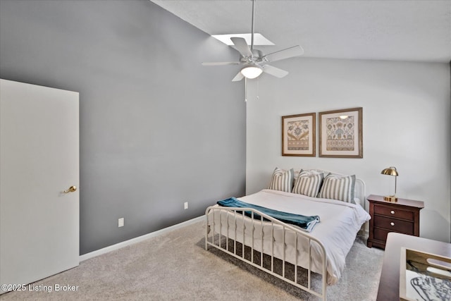 carpeted bedroom with baseboards, lofted ceiling, and ceiling fan