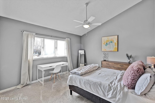 carpeted bedroom featuring baseboards, a textured ceiling, ceiling fan, and vaulted ceiling