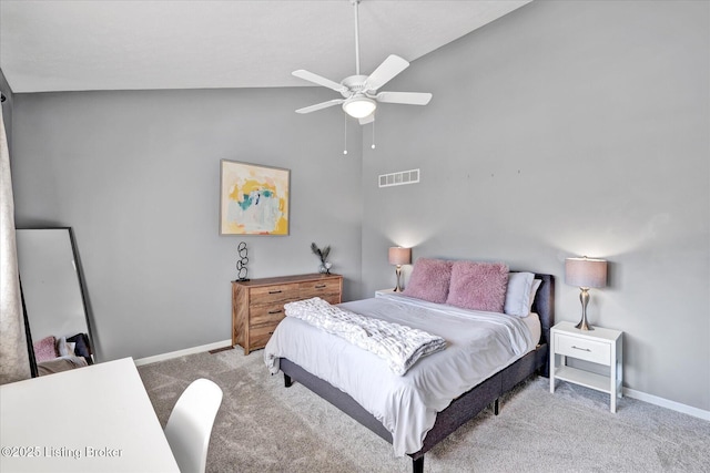 carpeted bedroom featuring visible vents, baseboards, ceiling fan, and vaulted ceiling