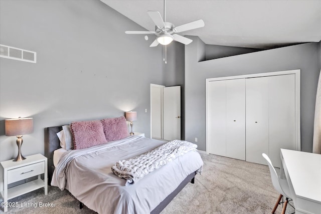 bedroom featuring carpet, visible vents, high vaulted ceiling, ceiling fan, and a closet